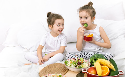 A balanced diet rich in fruits, vegetables, whole grains, and lean proteins helps children develo…