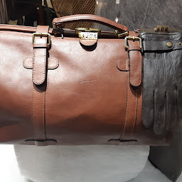 Photo n°29 de Au Porté Main à Lesneven (Magasin de maroquinerie)