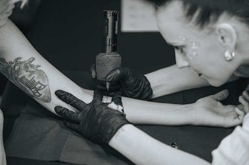 Mondo Fine Line Tattoo