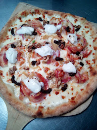 Photo n°46 de Nulle Pizz'Ailleurs — Pizzas à emporter, Genay (69) à Genay (Pizzeria)