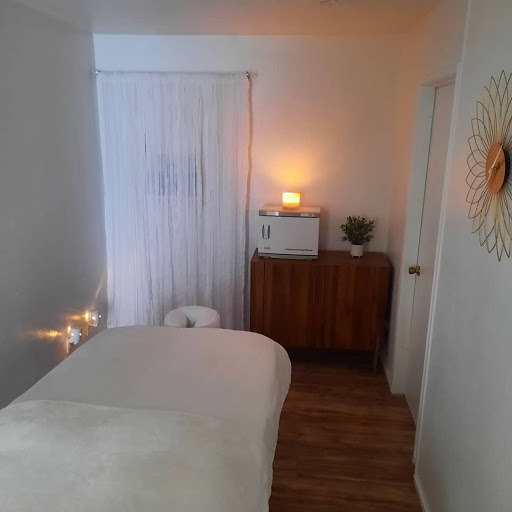 Unwind Massage & Esthetics Logo