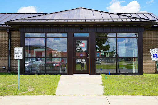 R.I.A. Federal Credit Union - Fort McCoy - Gated Military Base Logo