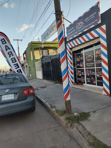 The barber haircuts & shaves Yazmin Vasquez