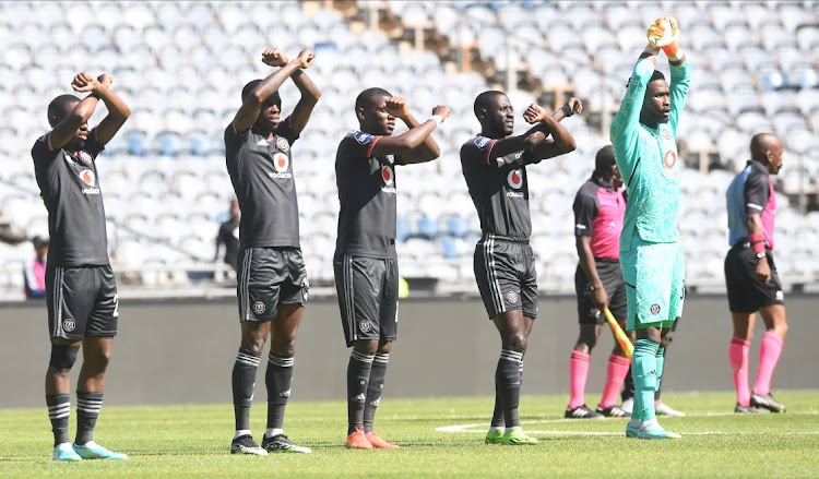 Orlando Pirates players take the field before the DStv Premiership match against Stellenbosch FC at Orlando Stadium on January 22, 2023.