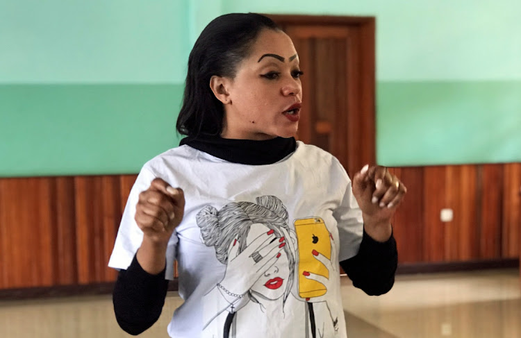 Congolese dance teacher Amina Lusambo talks to rape survivors at a rehabilitation centre attached to the Panzi Hospital before a dance session in Bukavu, South Kivu province in eastern Democratic Republic of Congo. File photo: REUTERS/DJAFFAR AL KATANTY