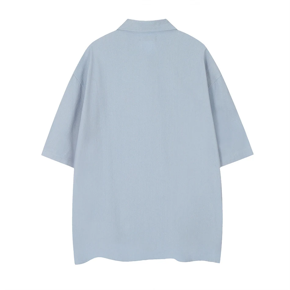 Camisa de verano polo informal holgada con diseño bordado, cuello polo. Ideal para un look fresco y cómodo en días calurosos.