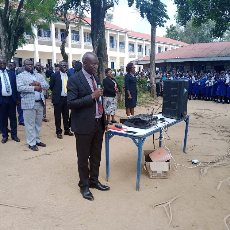 Government officials address students at St. Theresa's Eregi Girls' High School on October 4, 2023.