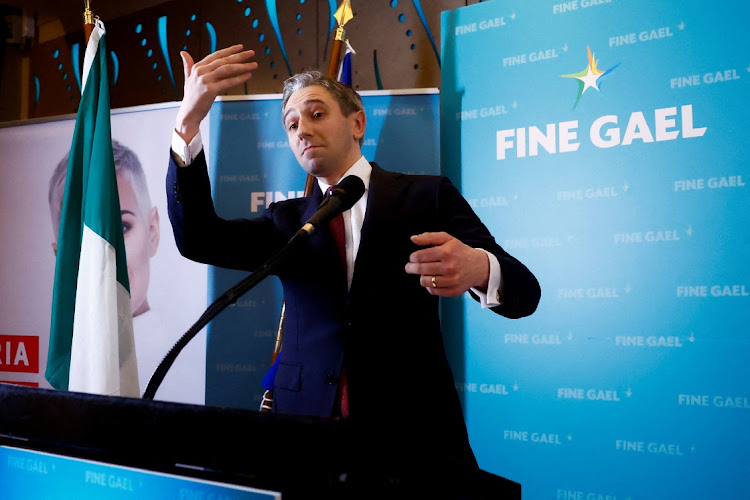 Ireland’s minister for higher education, Simon Harris, calls minister for social protection, Heather Humphreys, to the stage as he speaks after being announced as the new leader of Fine Gael at the party's leadership election convention, in Athlone, Ireland, March 24. Picture: REUTERS/CLODAGH KILCOYNE