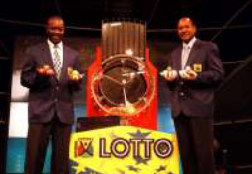 MIRAGE: Will Uthingo's lottery machine spin winning numbers again? Pic. Sefako Mabuya. 25/07/2000. © Sowetan.