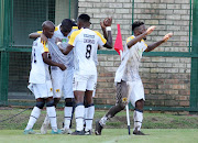 Zimbabwe international Ovidy Karuru celebrates with his Black Leopards teammates after scoring his second goal of the match. 