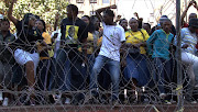 Julius Malema supporters dance at Luthuli House.