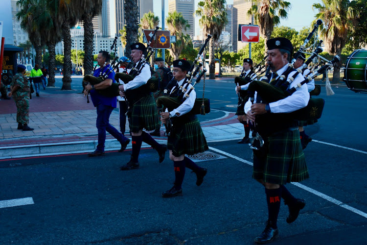 A pipe band gets into the swing of things as final preparations are put in place and last-minute dry runs completed ahead of the president's state of the nation address.