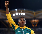 Caster Semenya is challenging regulations that require her to lower her natural testosterone levels through hormone treatment in order to be eligible to compete as a woman. File photo.