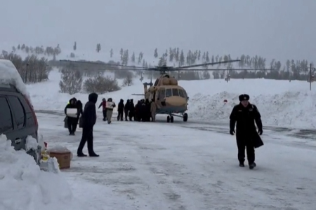 Tourists stranded as a result of avalanches hitting highways are airlifted to safety by helicopter in Burqin County, Xinjiang province, China in this screengrab from social media video released on January 15 2024.