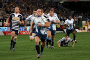 Francois Hougaard of the Bulls on the run to score his try during the Super Rugby match between the Stormers and the Bulls at Newlands on June 11, 2011 in Cape Town, South Africa