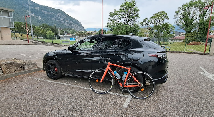 Why ride a bicycle up the French Alps when a perfectly good Alfa Stelvio will do? Picture: DENIS DROPPA