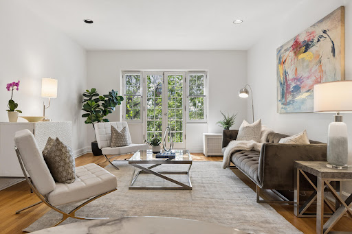 Buy this luxury property in Denver (United States) - Modern living room with sofa and white armchairs