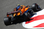 Lando Norris of Great Britain driving the (4) McLaren F1 Team MCL35M Mercedes on track during Day Three of F1 Testing at Bahrain International Circuit on March 14, 2021 in Bahrain, Bahrain.