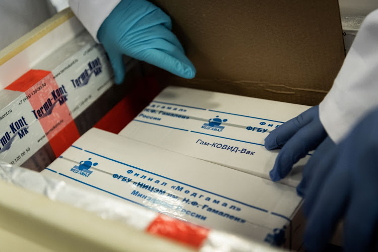 Laboratory assistants unpack Russia's "Sputnik-V" vaccine against the coronavirus disease (Covid-19) at the National Institute of Pharmacy and Nutrition in Budapest, Hungary last month.