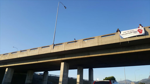 Protesters on a bridge over the N1 in Cape Town on Thursday morning Picture: Tamzen Titus