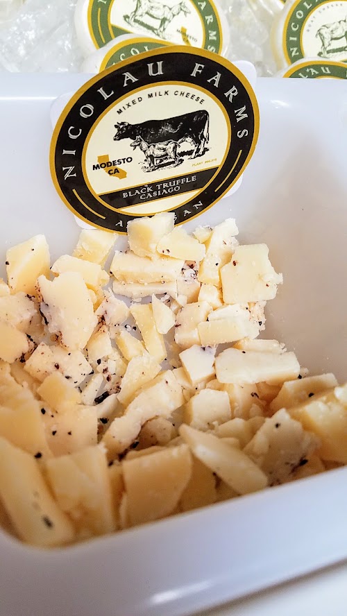 At the California Artisan Cheese Festival 2018 Artisan Cheese Tasting and Marketplace, Black Truffle Casiago from Nicolau Farms