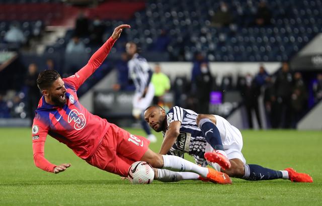 Chelsea's Olivier Giroud in action with West Bromwich Albion's Matthew Phillips