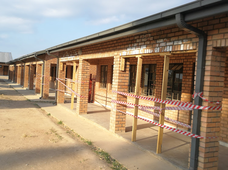 Sections of wall in front of some new classrooms at Vhafamadi High School have had to be propped up because of structural problems caused by poor workmanship.