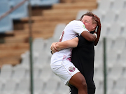 Sphesihle Mbhele of Swallows FC celebrates with coach Dylan Kerr in the Nedbank Cup last-32 match against TS Sporting at Dobsonville Stadium in Soweto on the February 5 2022.