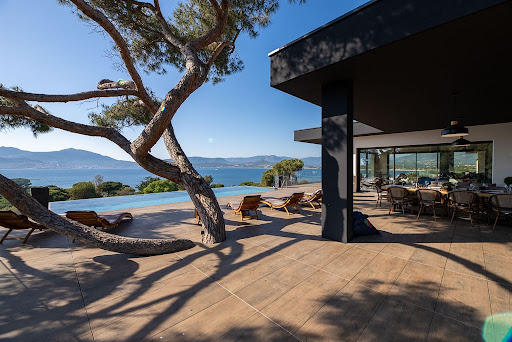 Terrace with infinity pool sea view in this luxury house for seasonal rental in Porticcio ($10,078 - 430 m²)