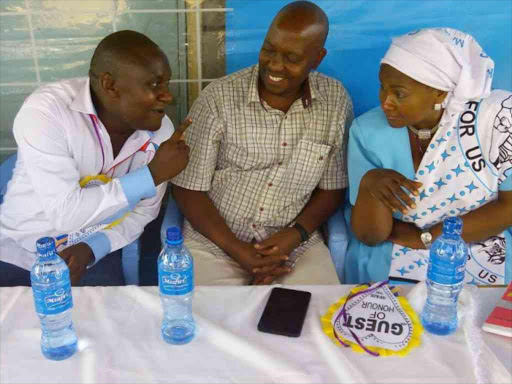 Mwala MP aspirant Albanus Muthama, Machakos Deputy Governor Bernard Kiala and CCU leader Wavinya Ndeti during a funds drive at Yathui Catholic Church on Sunday / ANDREW MBUVA