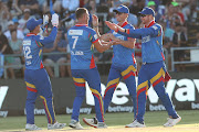 Durban Super Giants players celebrate the dismissal of Grant Roelofsen of MI Cape Town by Prenelan Subrayen at Newlands Stadium in Cape Town.