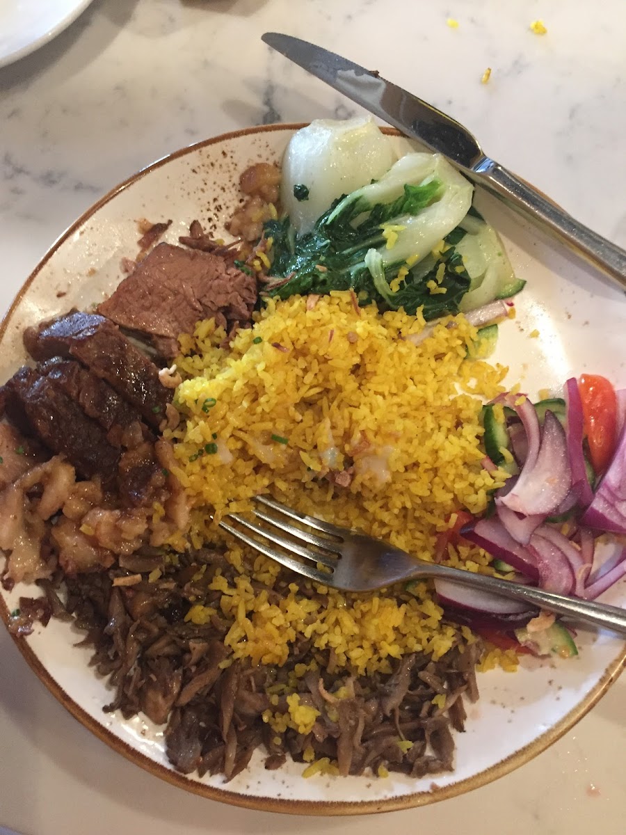 rice plate with brisket, bok choy, cucumber salad and sauteed mushrooms