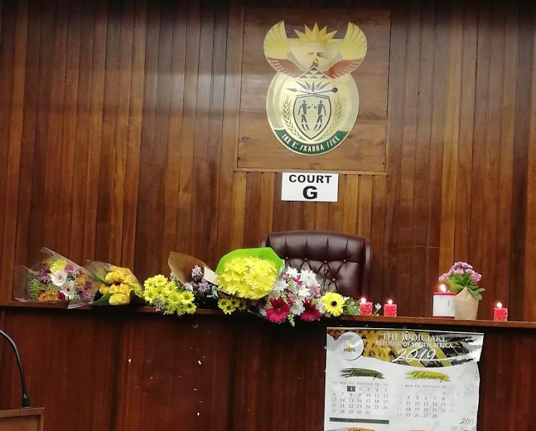 Colleagues of slain magistrate Bonge Tenza left flowers and lit candles in her empty courtroom at the Durban Magistrate's Court on Thursday March 7 2019.