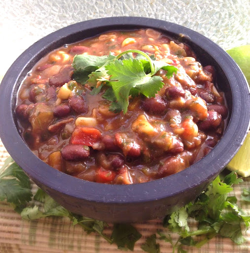 This full-flavored, spicy, smoky, black bean soup is full of vegetables (shhhh, and bacon)!  It's a fantastic, satisfying meal that can pleases kids and adults alike. It is a one-pot wonder that will leave you, your family and guests yearning for more! 