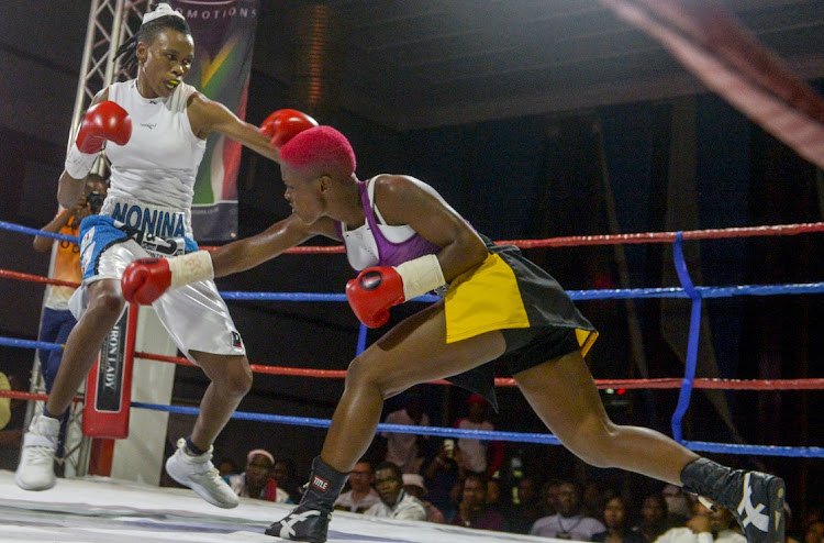 Bukiwe Nonina of Limpopo weighed in at 53,12kg for World WBF female bantam eight title wins against Matshidiso Mokebisi of the Free State weighed in at 53,52kg for World WBF female bantam weight title during the OR Tambo Boxing Tournament at Ferdi Meyer Hall on October 26, 2017 in Welkom, South Africa.