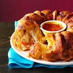 Pizza Monkey Bread Recipe was pinched from <a href="http://www.tasteofhome.com/recipes/pizza-monkey-bread" target="_blank">www.tasteofhome.com.</a>