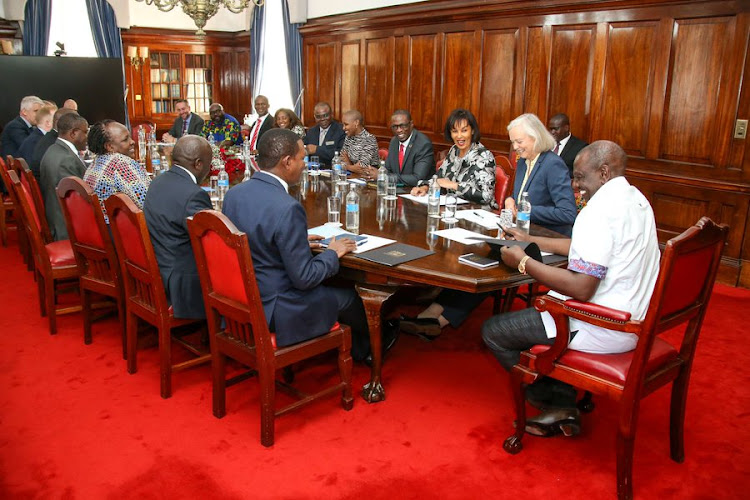 President William Ruto with members of the Chamber of Commerce and US Ambassador Megan Whiteman at State House on March 2, 2023.