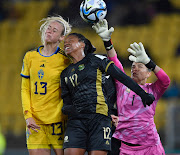 Banyana Banyana goalkeeper Kaylin Swart (right) and forward Jermaine Seoposenwe (centre) get up to challenge of Sweden's Amanda Ilestedt in the Fifa Women's World Cup group G match at Wellington Regional Stadium in New Zealand on on July 23 2023.