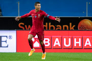 Cristiano Ronaldo of Portugal celebrates after scoring the 0-1 goal during the UEFA Nations League group stage match between Sweden and Portugal at Friends Arena on September 8, 2020 in Stockholm, Sweden. 