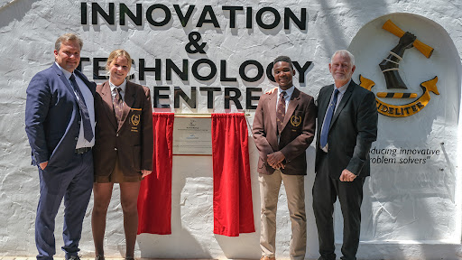 From left: Siegfried Lokotsch, operations director at Jendamark Automation; incoming Woodridge College head girl Hannah Praetorius; head boy Buzwe Pango; and headmaster Derek Bradley.