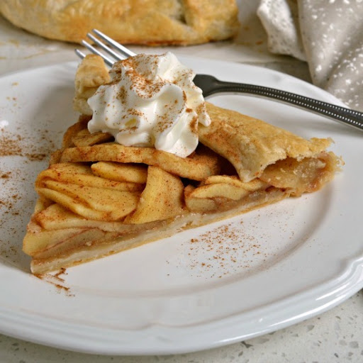 This simple yet elegant Apple Galette has the full flavor and spice of an apple pie with a fraction of the work.  Bake one for your family today and they will be singing your praises.