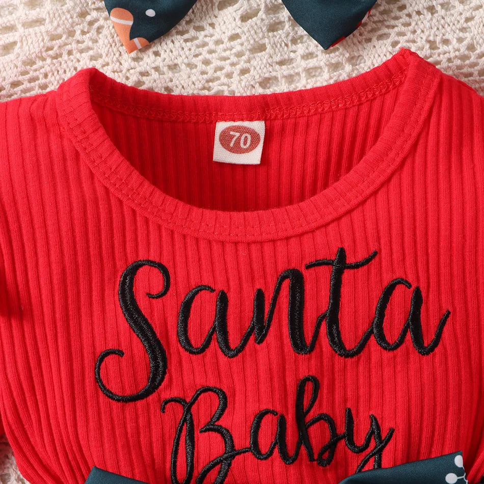 Barboteuse jupe imprimée Père Noël pour fille Ensemble festif et confortable pour célébrer Noël avec style. Tenue adorable pour les fêtes.