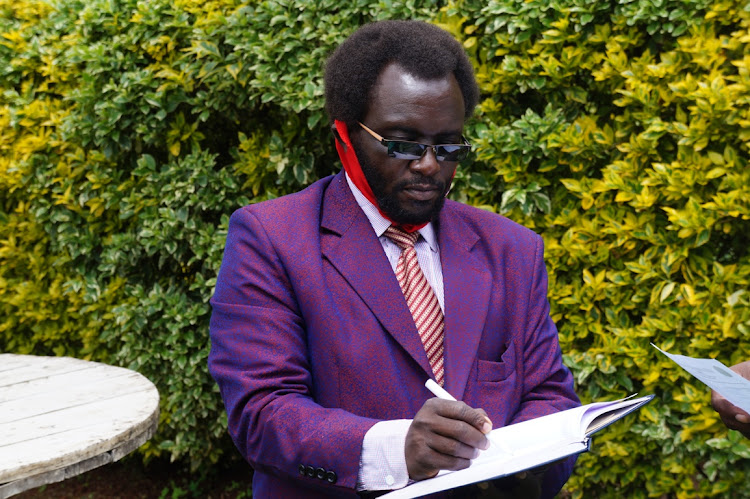 Voice of Men and Children chairman James Njenga outside his office