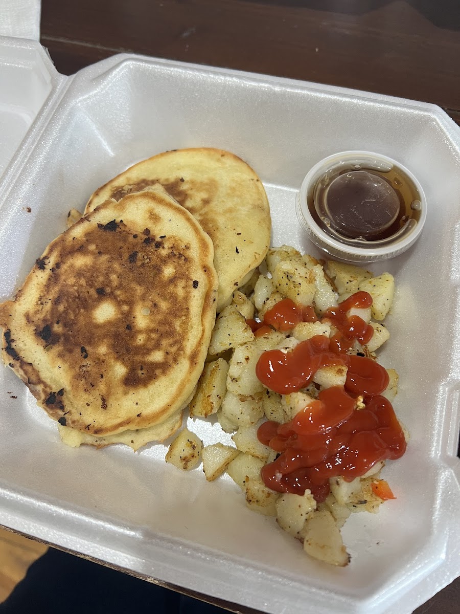 Chocolate chip pancakes, and side of breakfast potato potatoes