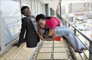 SHOWN THE DOOR: Kaone Ramontshonyane and Liz Coka paid a visit to Sowetan offices in Rosebank yesterday after being evicted from the Big Brother Africa Revolution house on Sunday night. Pic. Vathiswa Ruselo. 19/10/2009. © Sowetan.