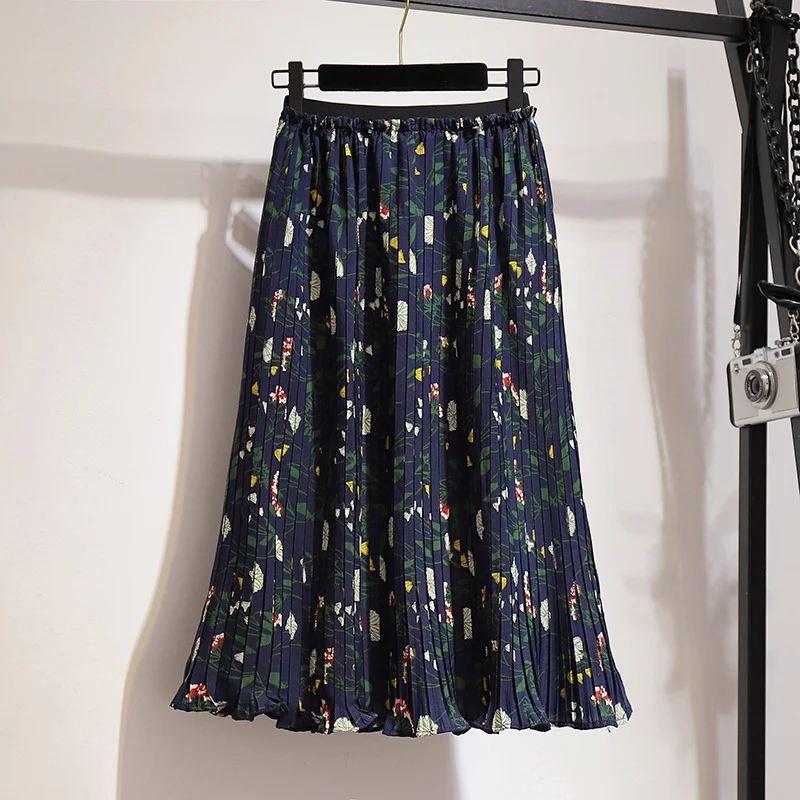 Losse, slanke chiffon geplooide rok voor een elegante en luchtige look. Perfect te combineren met tops, biedt comfort en een flatterende pasvorm.