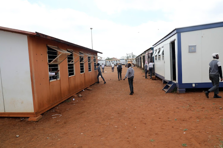 Simunye pupils still have to use container classrooms that have been there for 29 years .