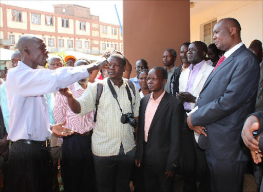 OUR POINT: Busia sugarcane farmers speak to Governor Sospeter Ojaamong at his office on Tuesday. Photo/Reuben Olita