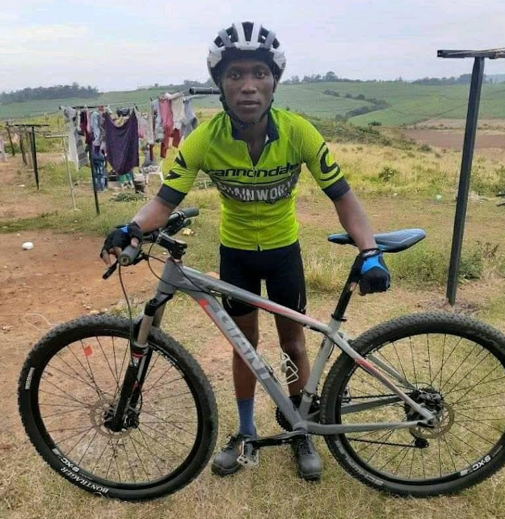 Sihle Maphumulo, a cleaner by profession and avid cyclist, with his bicycle which was forcibly taken from him on Wednesday.