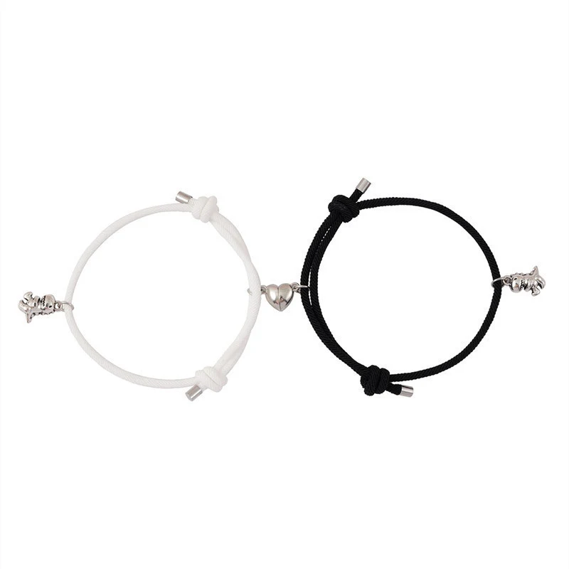 Bracciale coppia con chiusura magnetica e a ventosa, ciondolo dinosauro 3D, un regalo tenero e originale per innamorati.